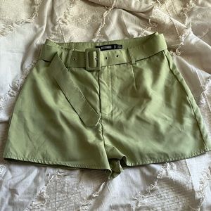 Green belted shorts